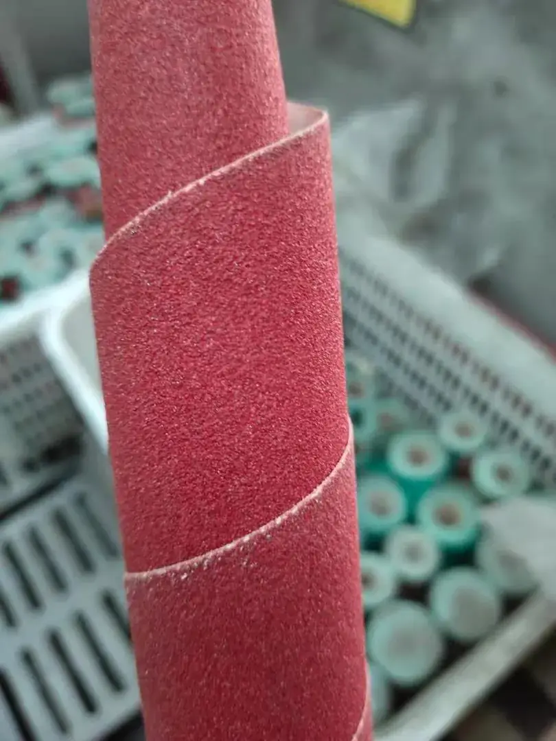 An abrasive sanding belt
