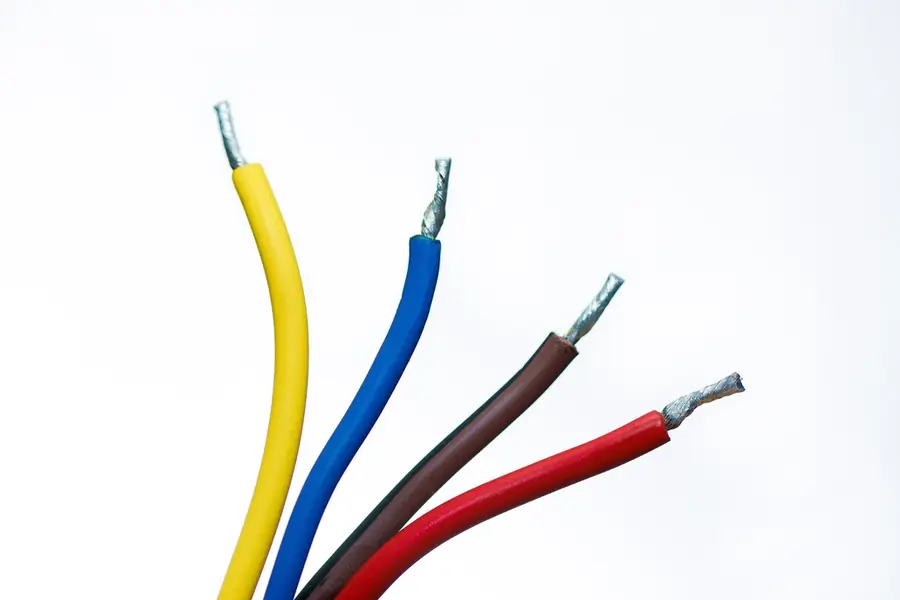 Coloured electrical wires with stripped ends