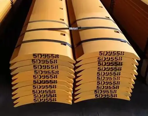 Stacked grader blades stamped with their part number
